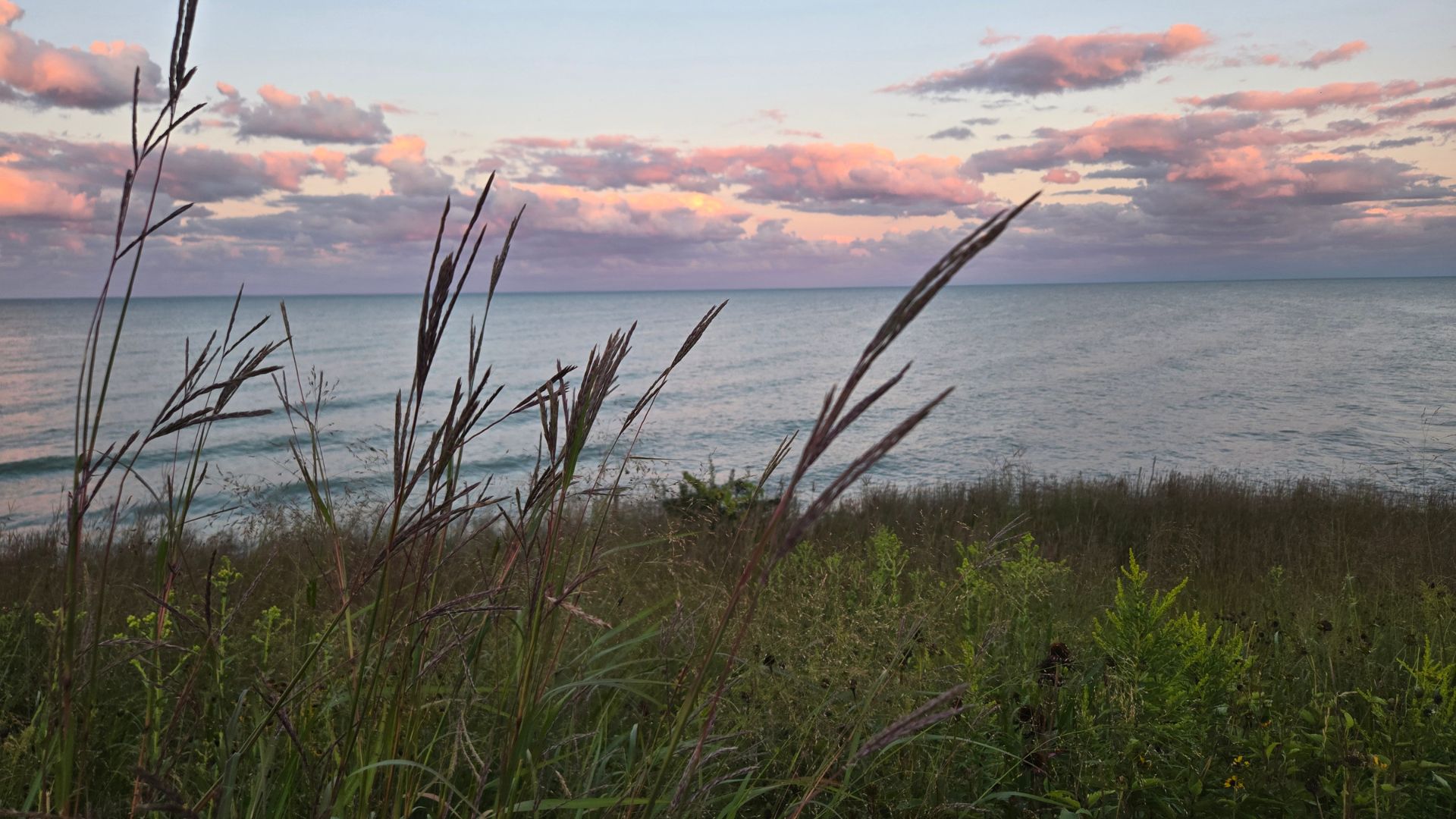 Lake Michigan shoreline at sunset near Lakeshore Commons