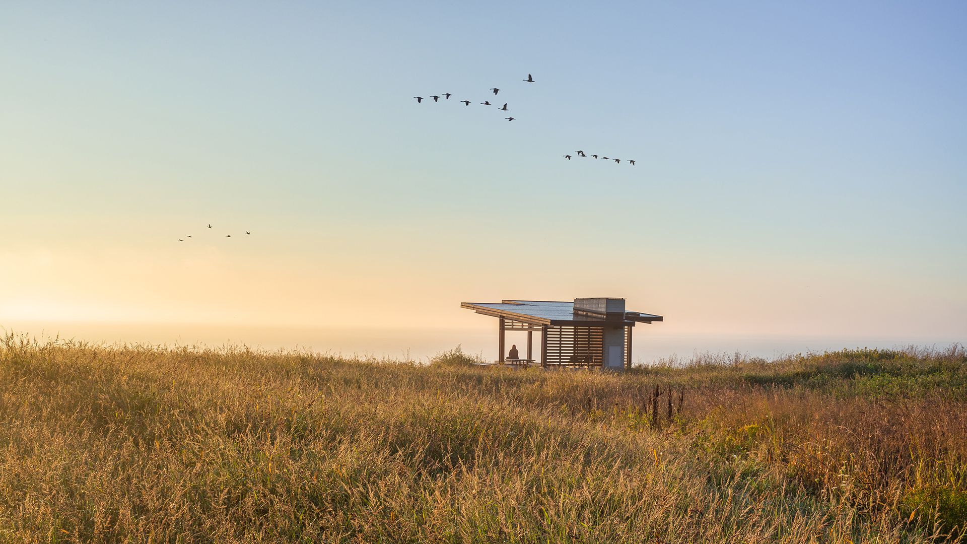 Lake Vista Park shelter at sunrise overlooking Lake Michigan